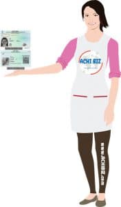 A domestic helper with identity card on hand