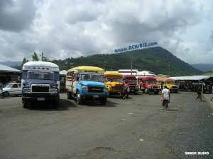 Parked buses with hills view at Samoa