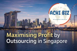 Singapore skyline at dusk featuring Marina Bay Sands and CBD, with “Maximising Profit by Outsourcing in Singapore” headline and Achibiz logo displayed prominently.